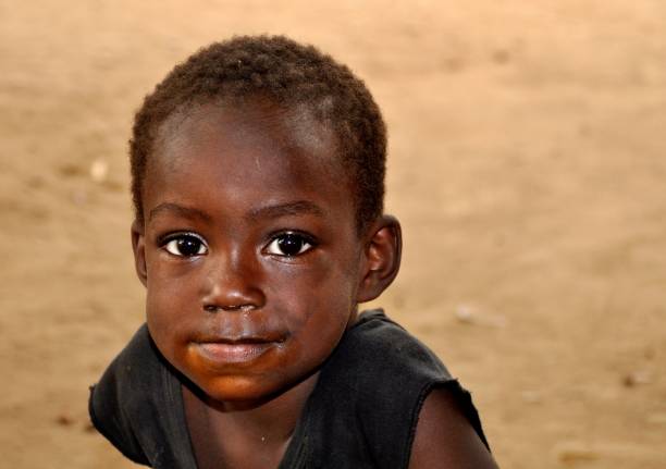 istock Close-Up Portrait Of Smiling Boy 1136759064