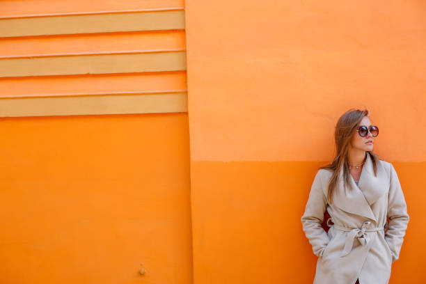 istock woman posing with sunglasses 1136759608