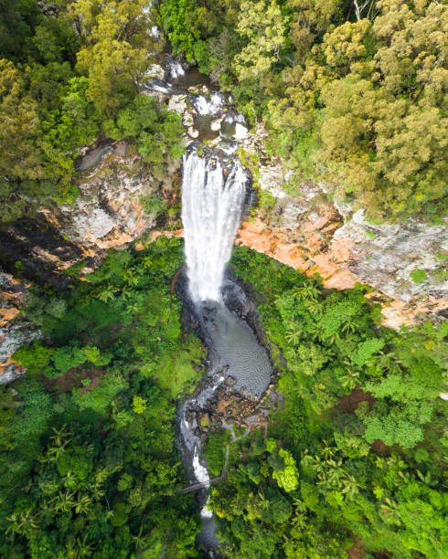 istock Aerial view of a waterfall at sunrise 1136760562