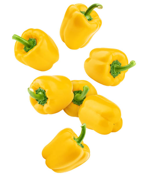 istock Falling sweet yellow pepper, paprika, isolated on white background, clipping path, full depth of field 1136760661