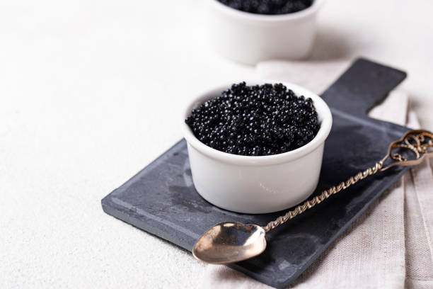 istock Sturgeon black caviar in bowls 1136763877