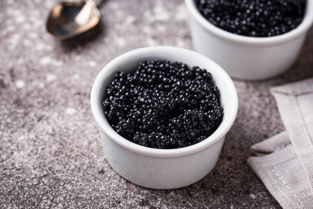 istock Sturgeon black caviar in bowls 1136763883