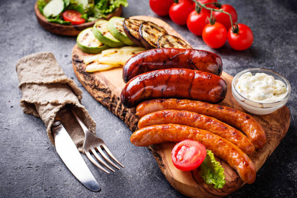 istock Assortment of grilled sausages and vegetables 1136764746