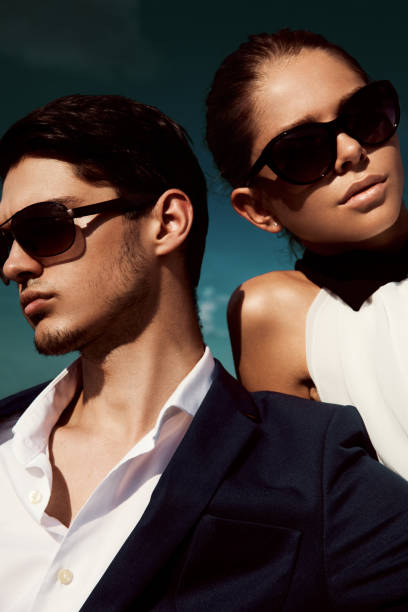 Sexy couple in sunglasses Sexy couple in sunglasses luxury eyewear stock pictures, royalty-free photos & images