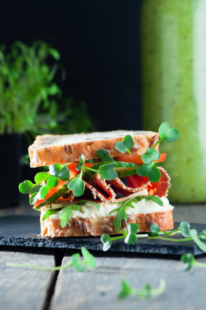 istock Homemade sandwich with whole grain bread and radish sprouts 1136765702