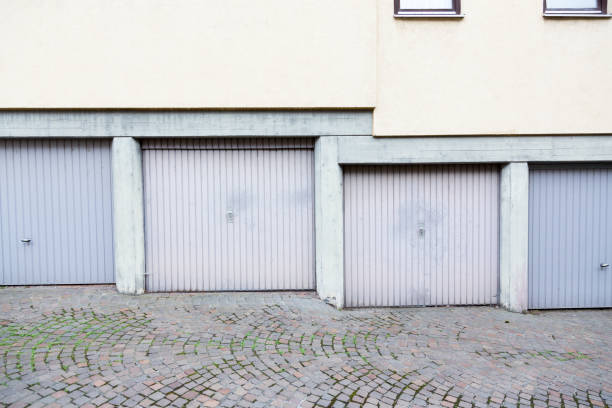 istock Closed metal glass exits garage fronts / facade in Germany / Europe. 1136766682