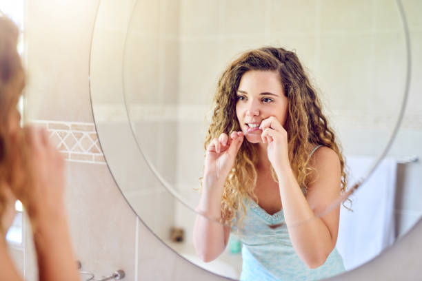 istock Flossing helps to prevent more germs and cavities 1136772202
