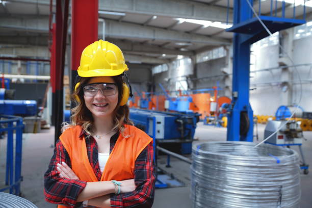 istock Young woman working in factory 1136773680