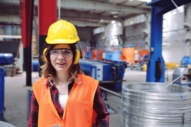 istock Young woman working in factory 1136773690
