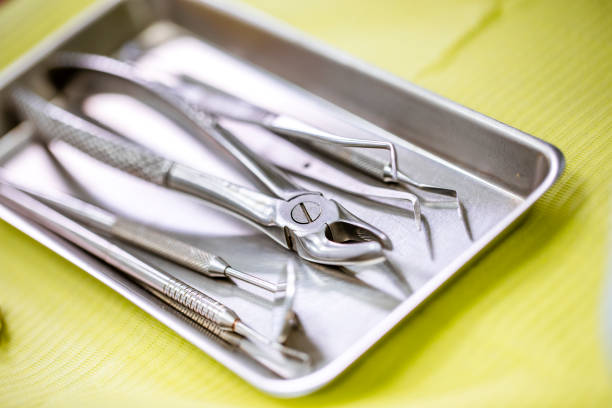 istock Sterilized dental instruments laid out on a medical plate, ready for use by a dentist 1136773862