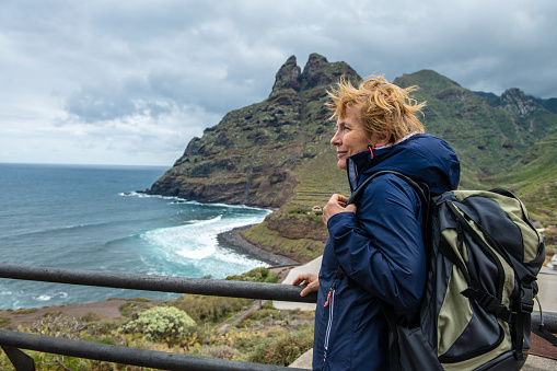 Woman exploring a beautiful island of Tenerife, Punta del Hidalgo, Canary Island. Spain.