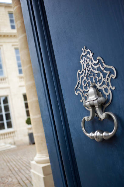 istock Stylish knocker on a wooden door 1136775066