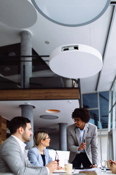 istock Young businessman giving presentation in the office 1136778137