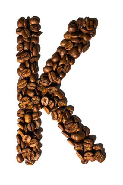 istock Roasted coffee bean letter K isolated on white 1136781047