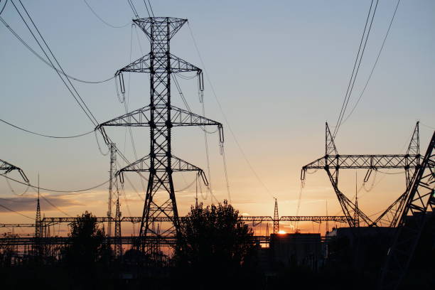 istock Low Angle View Silhouette Of Electricity Pylon Against Sky During Sunset 1136782396