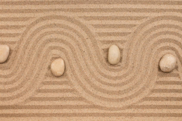 istock Curve made of sand and white stones. 1136782884