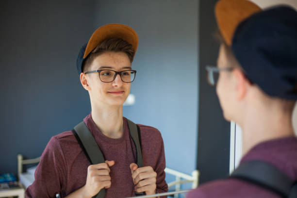 istock Teenage boy getting ready for school 1136787181