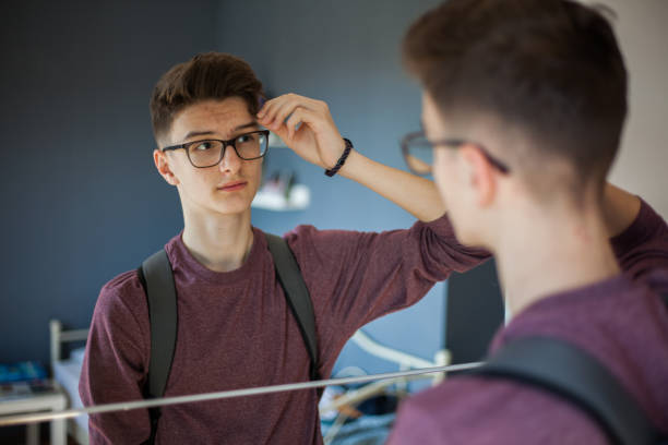 istock Teenage boy getting ready for school 1136787611