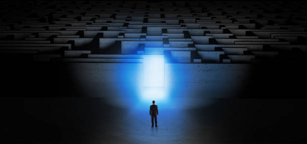 istock Businessman starting a dark labyrinth challenge 1136788091