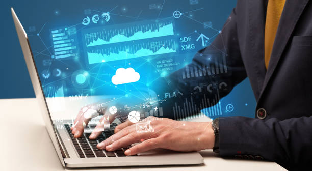 istock Hand typing on laptop graphs and charts and reports concept around 1136789451