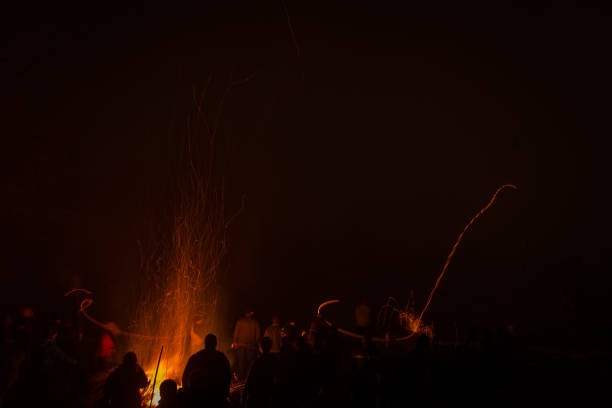 istock Disk flinging at Badenweiler Scheibenfeuer at night 1136789579