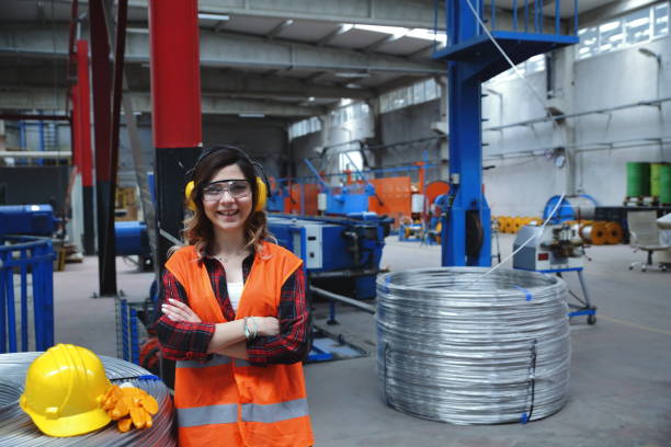 istock Young woman working in factory 1136789809