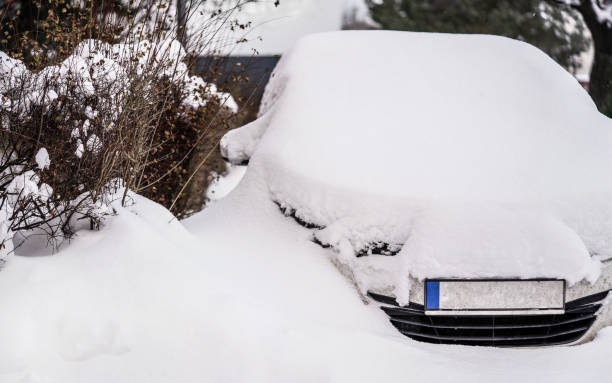 istock Car covered under thick layer of snow in winter. 1136790769