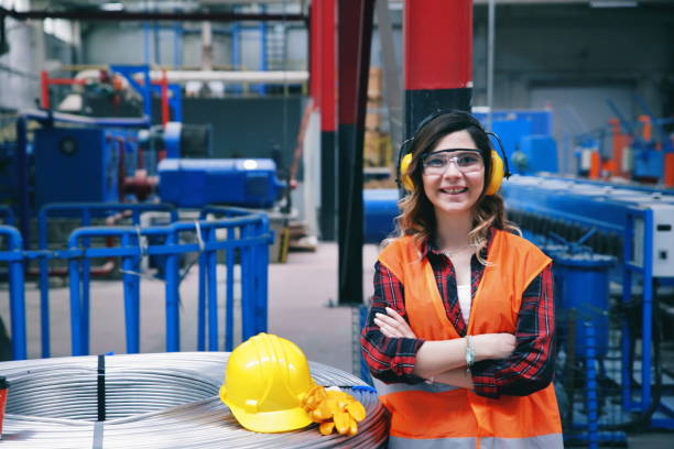 istock Young woman working in factory 1136791341
