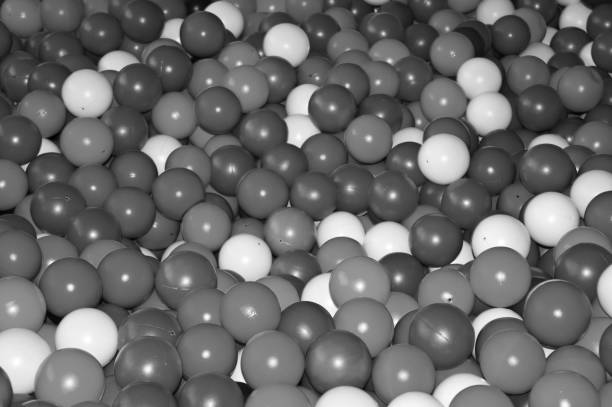 istock Black grey white balls for dry massage. Black-and-white photo. 1136791407