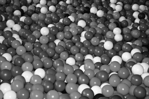 istock Black grey white balls for dry massage. Black-and-white photo. 1136791518