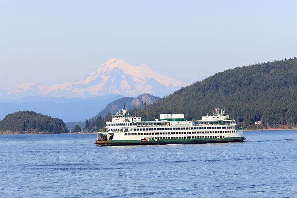 Puget Sound ferry with Mount Baker, Washington in the background stock photo