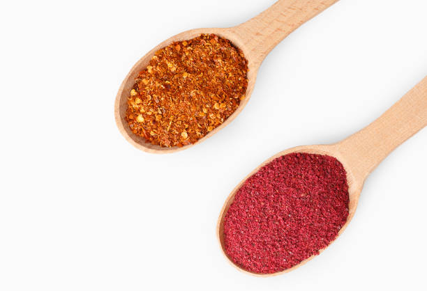 istock Wooden spoons with aromatic culinary condiments on white 1136794678