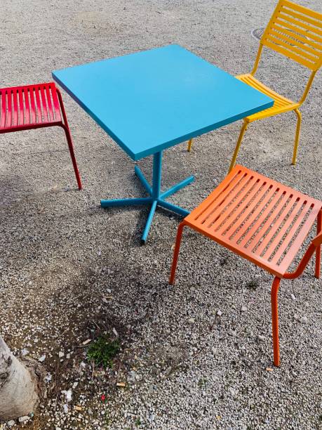 istock Colorful chairs and table outdoor 1136796895