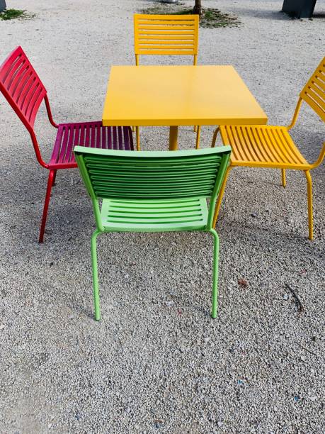 istock Colorful chairs and table outdoor 1136796906