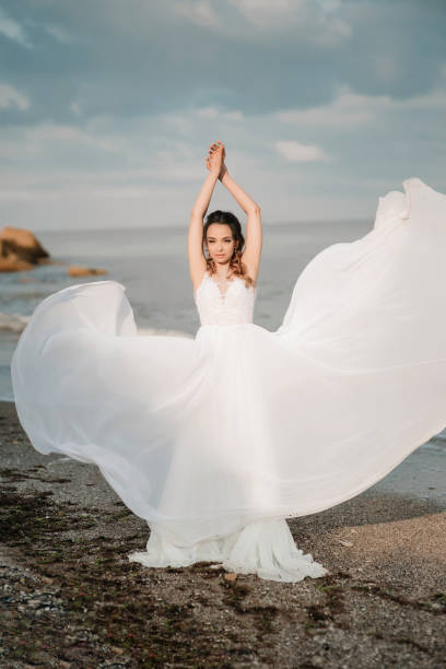 istock bride on the shore of the black sea 1136800381
