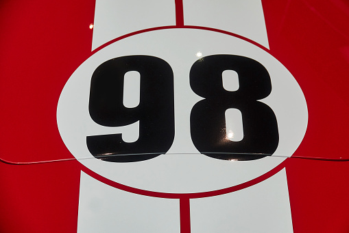 Number 98 on a vintage car