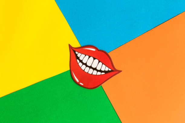istock Flat lay of funny smile on multicolored background abstract. 1136805209