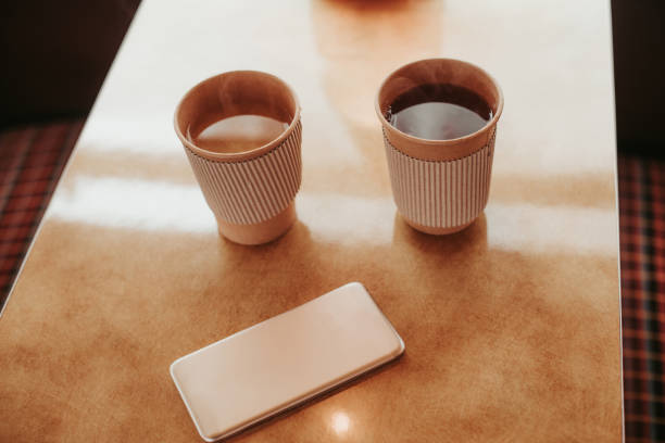 istock Close up two cup of coffee on table 1136807170