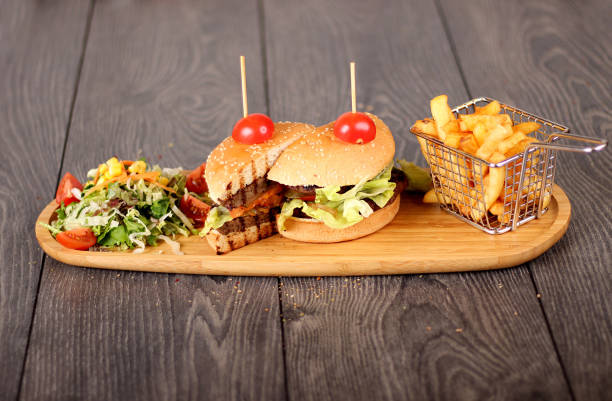 istock big hamburger in the wood plate 1136807739