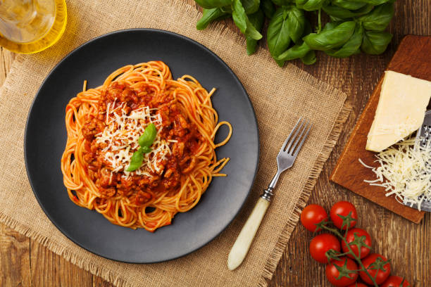 istock Delicious spaghetti served on a black plate 1136814122