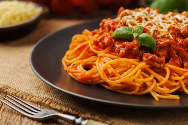 istock Delicious spaghetti served on a black plate 1136814148