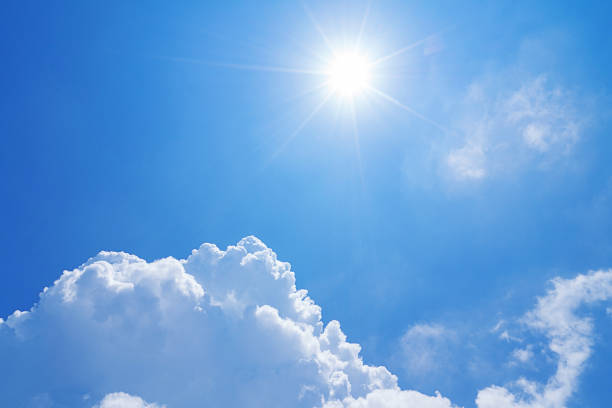 istock Natural clear beautiful blue sky with sun and white cumulus cloud 1136815426
