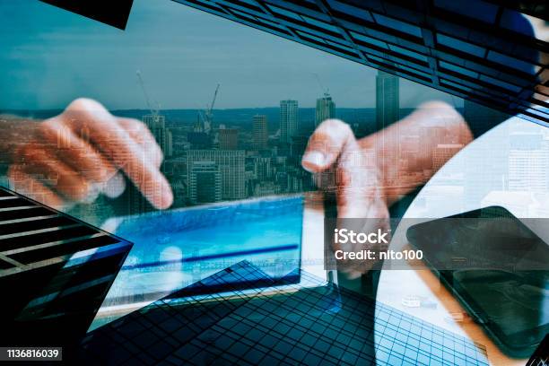 Financial District And Man Using Tablet Stock Photo - Download Image Now - Electronic Banking, Multiple Exposure, Abundance