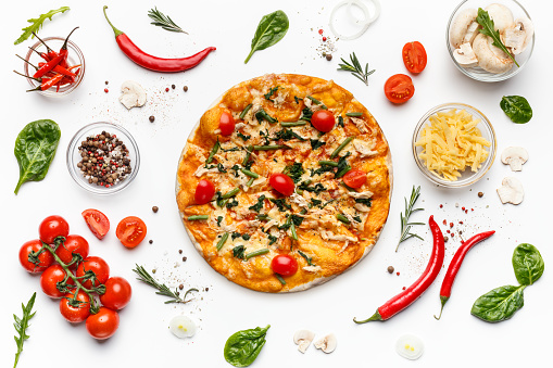 Italian pizza and various ingredients isolated on white background, top view