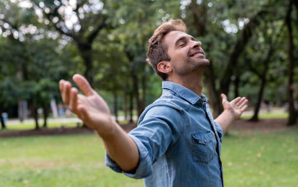 istock Peaceful man relaxing at the park 1136817989
