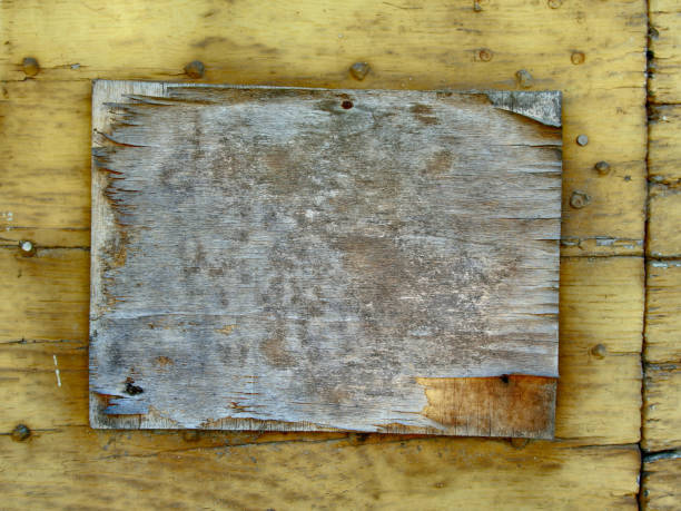 istock grungy wooden sign board 1136818088