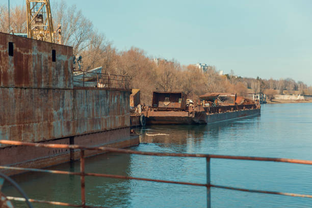 istock Old abandoned industrial river port 1136819352