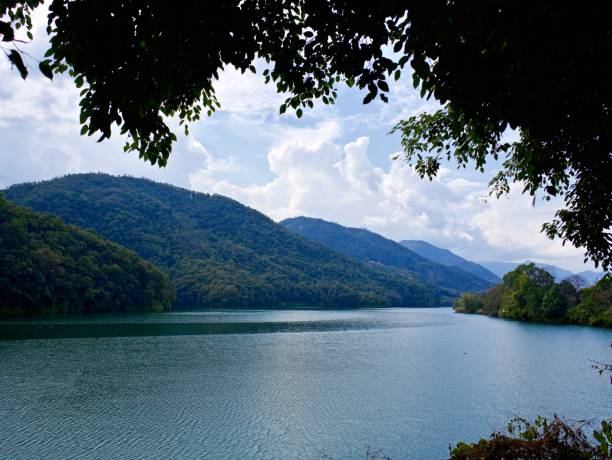 istock Blue Sky, Clouds, Mountains, Fewa Lake, Pokhara, Nepal 1136819540