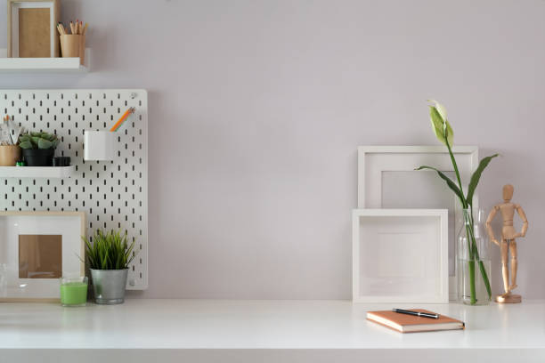 istock Workspace mock up poster and office accessories with copy space 1136819942