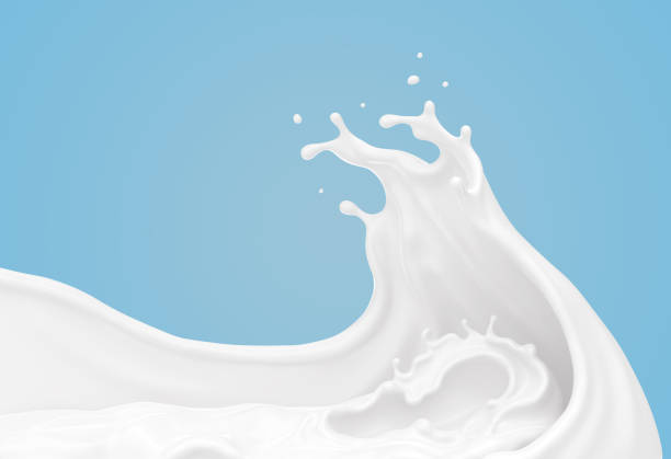 istock white milk or yogurt splash in wave shape. 1136821370